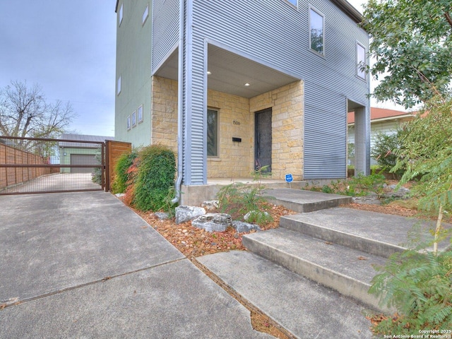 view of exterior entry featuring a garage