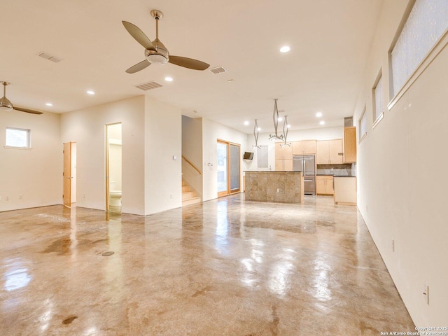 unfurnished living room featuring ceiling fan