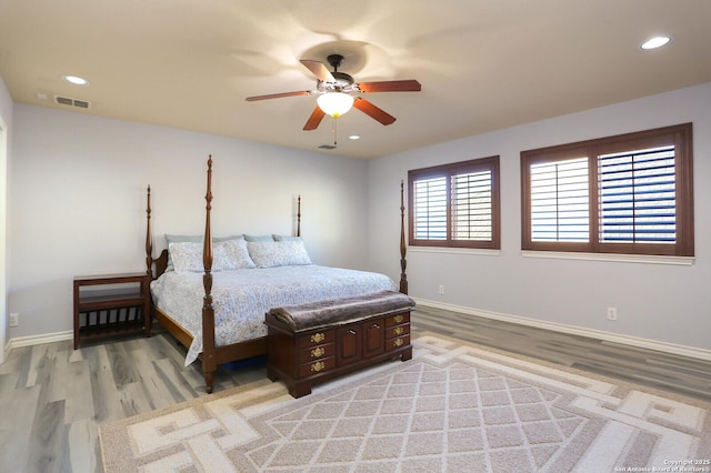 bedroom featuring ceiling fan and light hardwood / wood-style floors