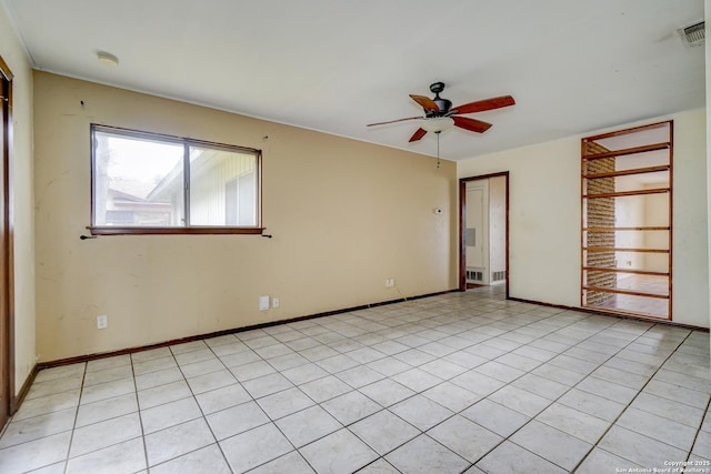 unfurnished room featuring ceiling fan