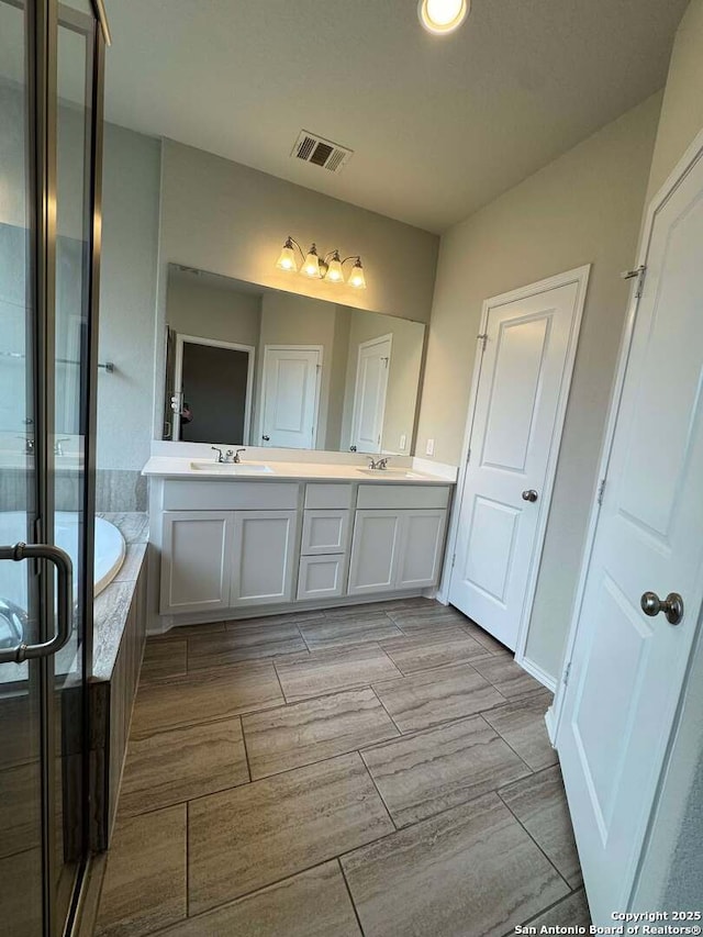 bathroom featuring a bathtub and vanity