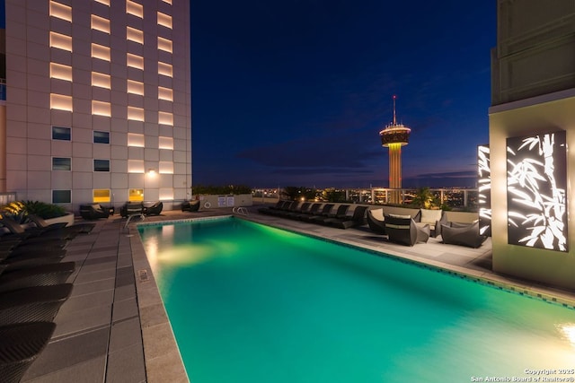 view of swimming pool featuring a patio area