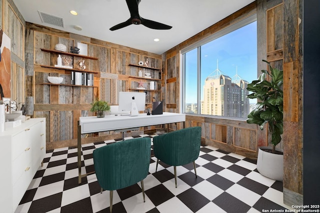 home office featuring ceiling fan and built in features