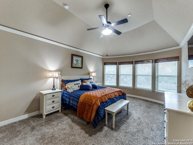 bedroom featuring lofted ceiling, light colored carpet, ceiling fan, and ornamental molding