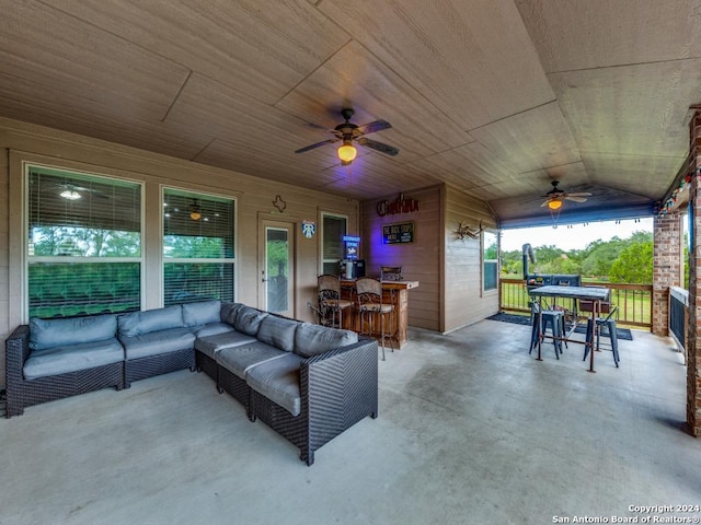 view of patio / terrace with ceiling fan and an outdoor hangout area