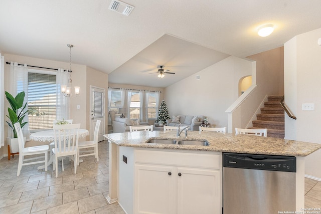 kitchen with ceiling fan with notable chandelier, white cabinetry, sink, hanging light fixtures, and stainless steel dishwasher