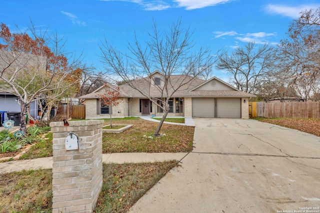 single story home featuring a garage