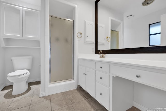 bathroom featuring an enclosed shower, vanity, and toilet