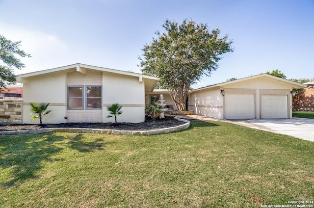 ranch-style house with a front lawn and a garage