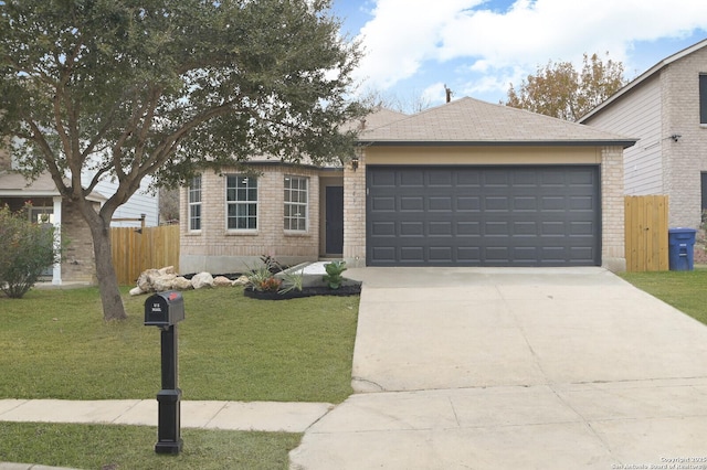 single story home with a garage and a front lawn