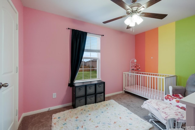 carpeted bedroom featuring ceiling fan