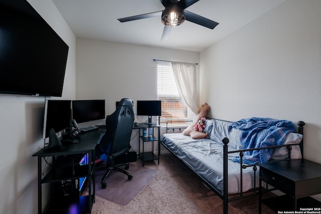 office area with ceiling fan and carpet floors