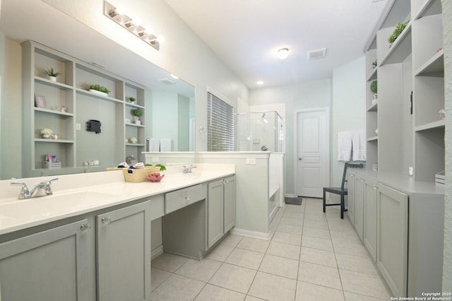 bathroom with vanity, tile patterned flooring, and shower with separate bathtub