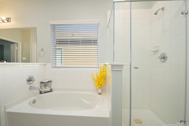 bathroom with independent shower and bath