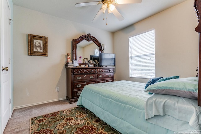 bedroom featuring ceiling fan and carpet flooring