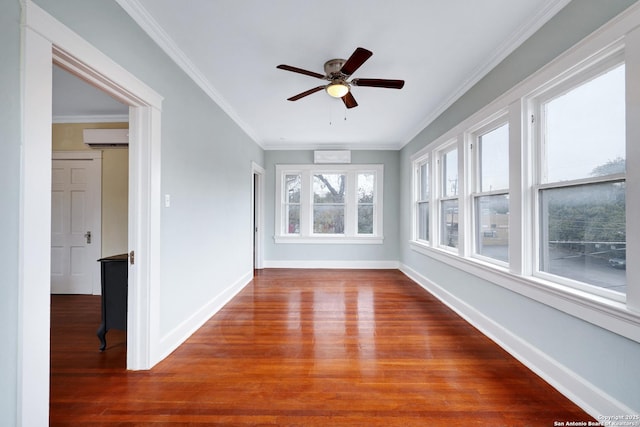 unfurnished sunroom featuring ceiling fan and a wall mounted air conditioner