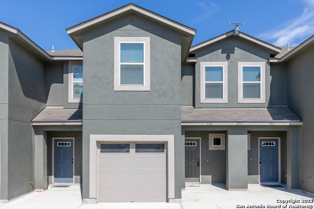 view of front of home with a garage