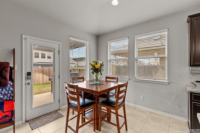 dining room with light tile patterned floors