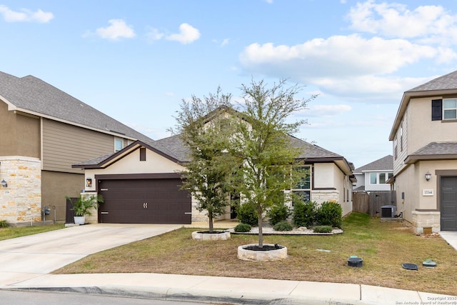 view of front of home featuring cooling unit and a front lawn