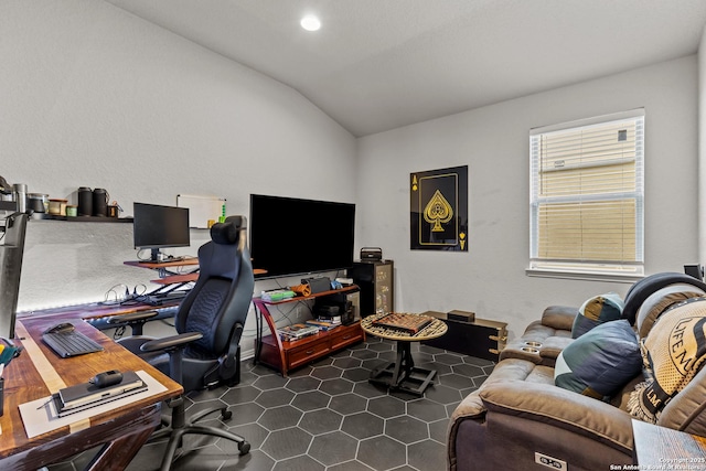 office area with vaulted ceiling