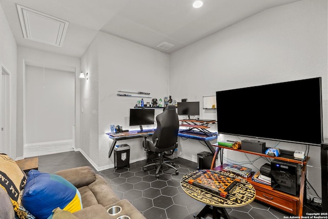 home office with dark tile patterned flooring