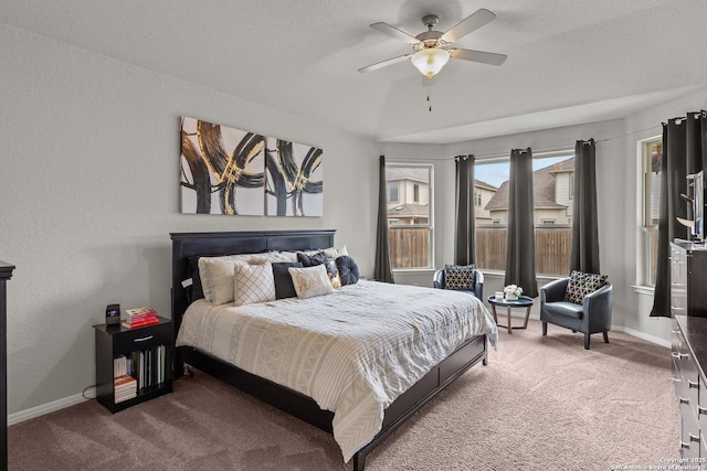 bedroom with ceiling fan and carpet