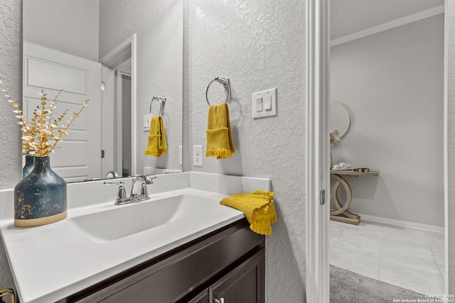 bathroom featuring vanity, ornamental molding, and tile patterned flooring