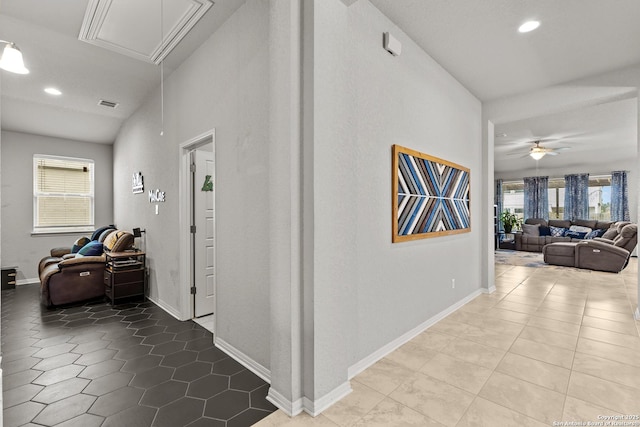 corridor with tile patterned flooring