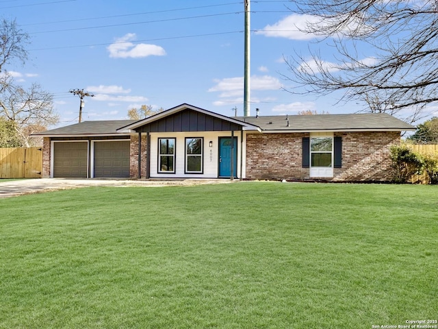 single story home with a front yard and a garage