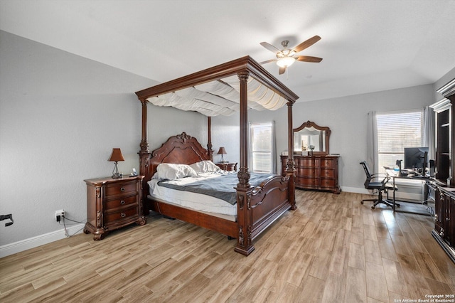 bedroom with ceiling fan and light wood-type flooring