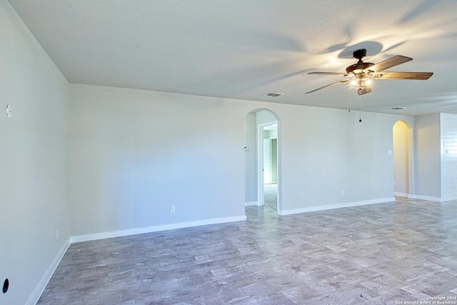 spare room with ceiling fan