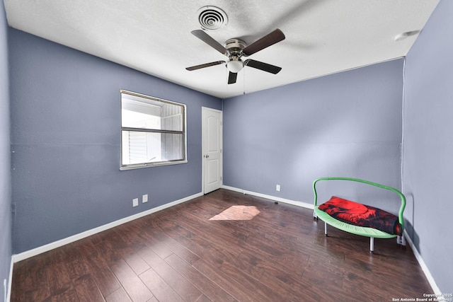 unfurnished room with ceiling fan and hardwood / wood-style floors