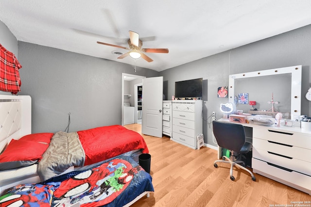 bedroom featuring ceiling fan and light hardwood / wood-style flooring