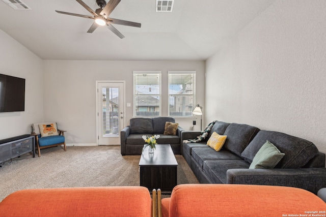 living room featuring ceiling fan and carpet flooring