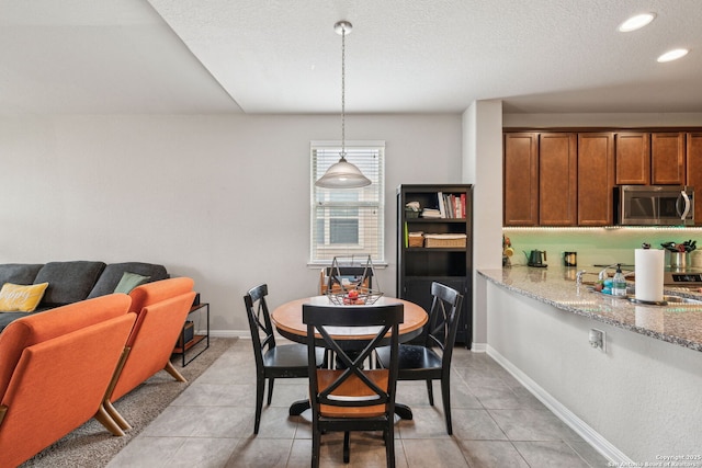 view of tiled dining area