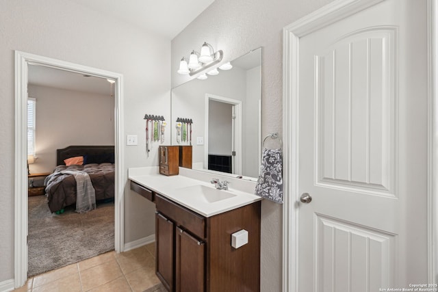 bathroom with vanity and tile patterned flooring