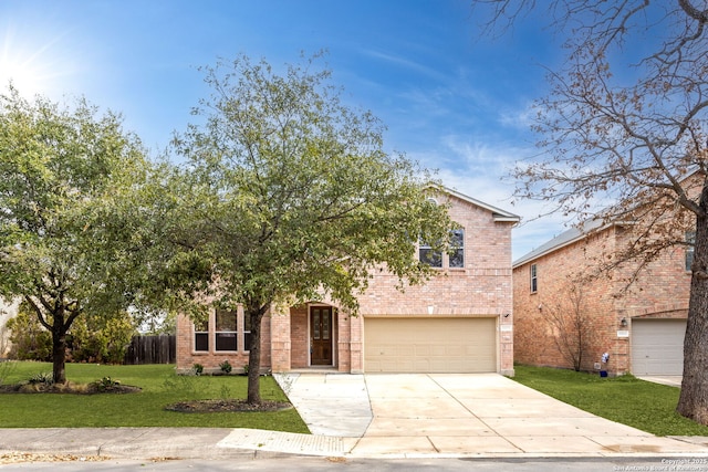 obstructed view of property with a garage and a front yard