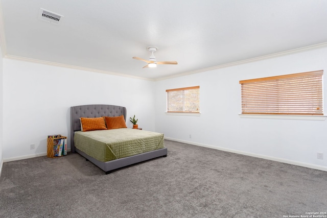 bedroom with ceiling fan, carpet, and crown molding