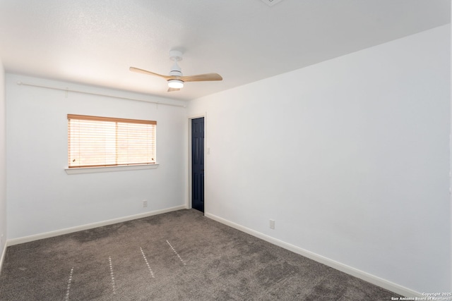 carpeted empty room with ceiling fan