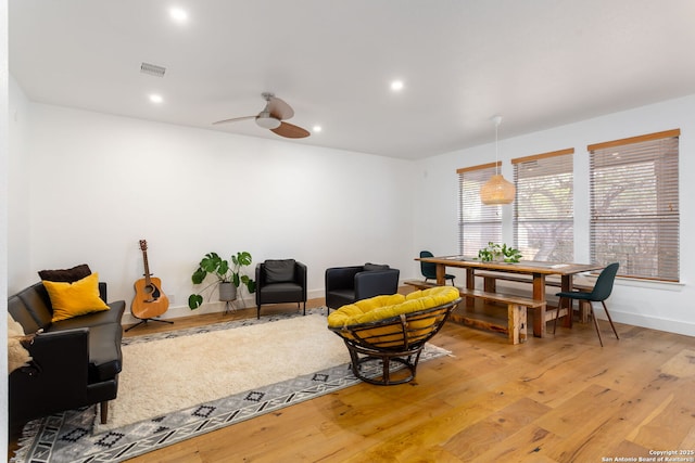 interior space featuring ceiling fan and light wood-type flooring