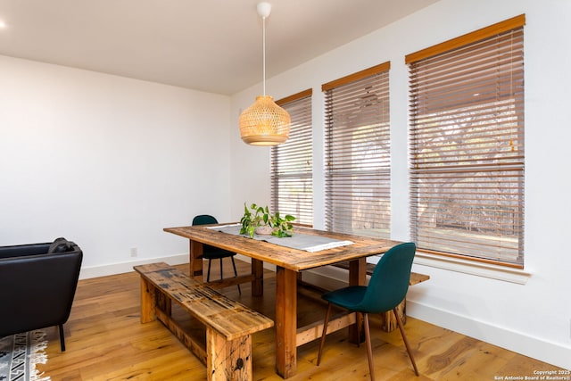 dining space with light wood-type flooring