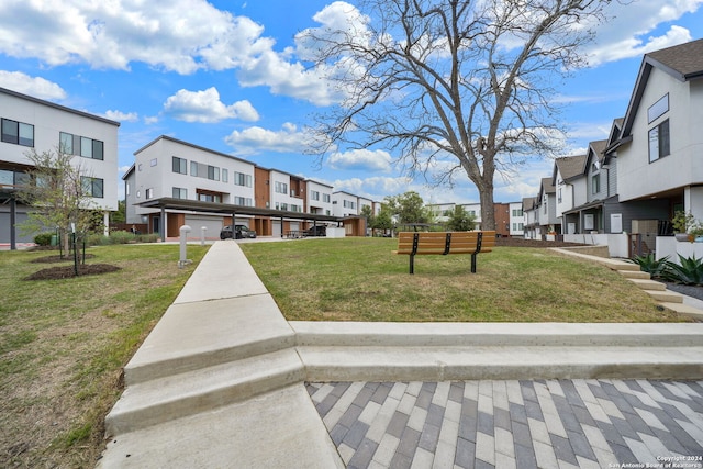 view of community featuring a yard