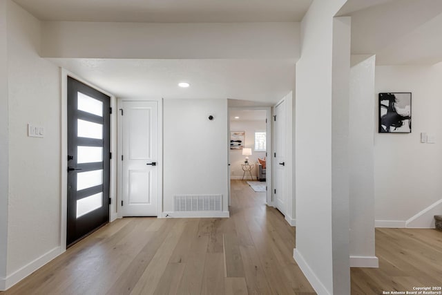 entrance foyer featuring light hardwood / wood-style flooring