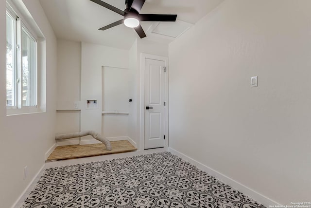 clothes washing area featuring ceiling fan