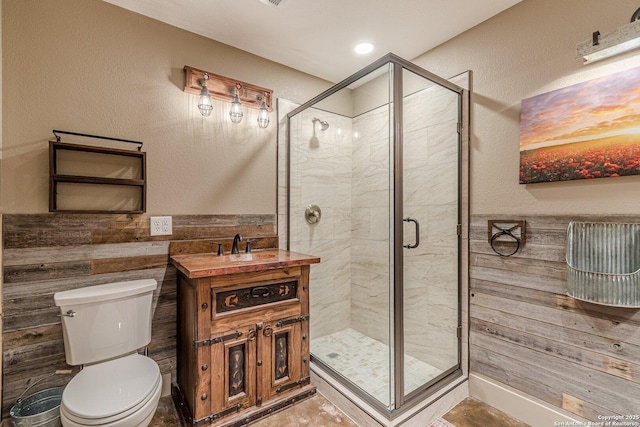 bathroom featuring sink, toilet, and walk in shower