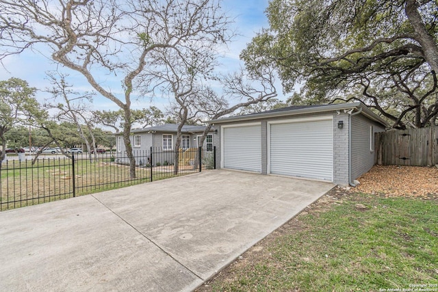 garage with a lawn