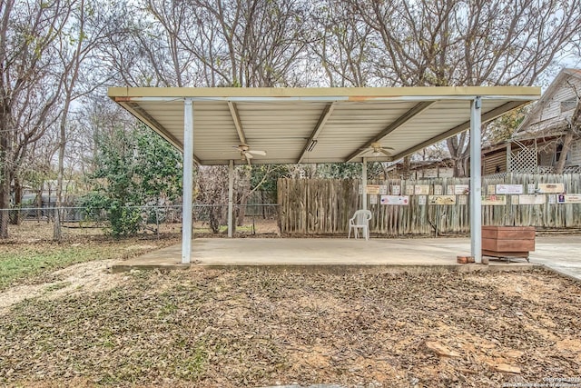 exterior space featuring a patio, fence, and a ceiling fan