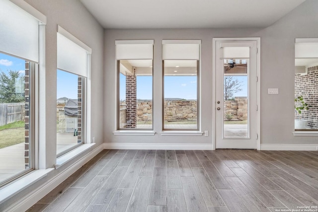 interior space with hardwood / wood-style floors