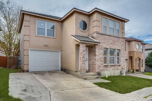 view of front of home with a garage