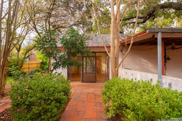 entrance to property with a patio area